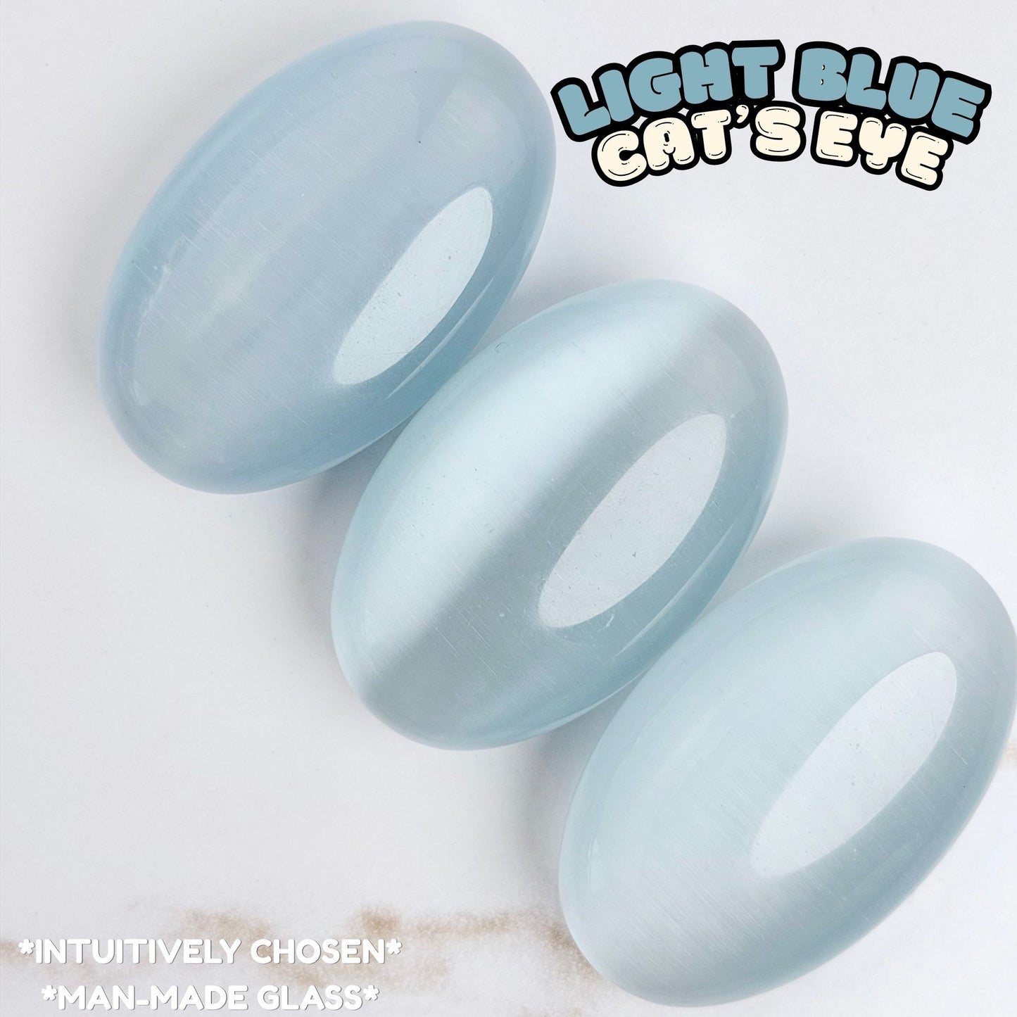 Light Blue Cat's Eye Palm Stone | Synthetic