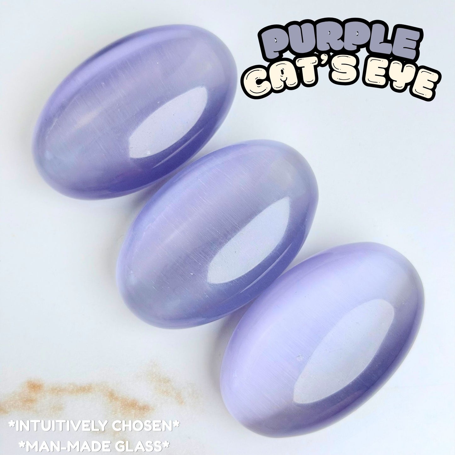 Purple Cat's Eye Palm Stone | Synthetic