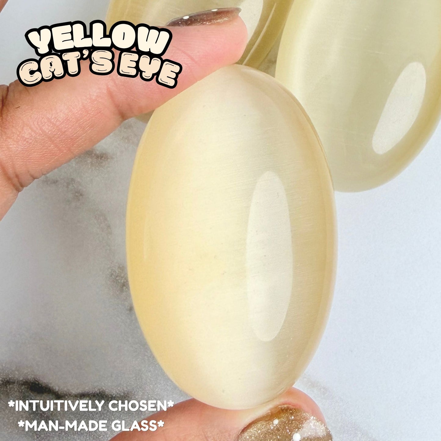 Yellow Cat's Eye Palm Stone | Synthetic